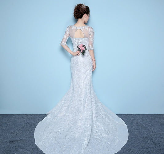 Robe de mariée queue de poisson à la taille