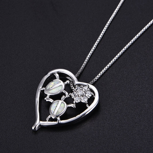 Collier pendentif tortue en or blanc