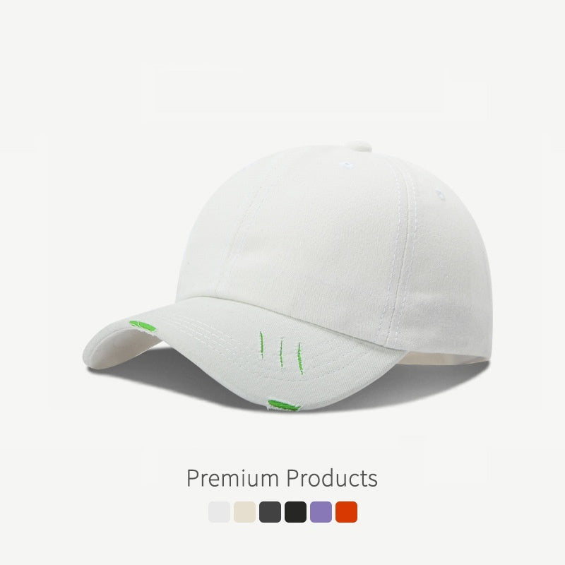 Casquette de baseball à visière incurvée et déchirée