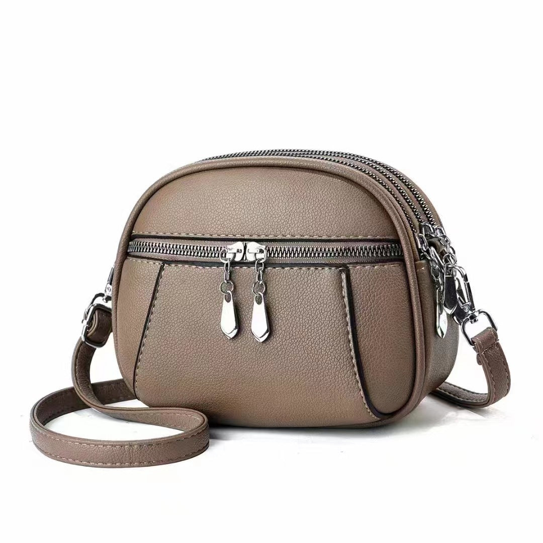 Petit sac à bandoulière rond multi-poches à la mode pour femmes