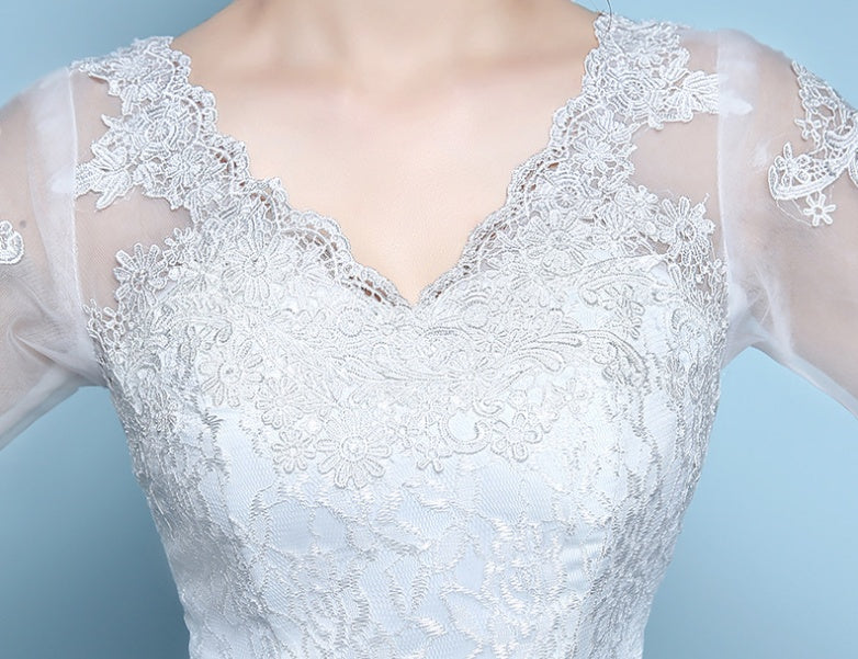 Robe de mariée queue de poisson à la taille