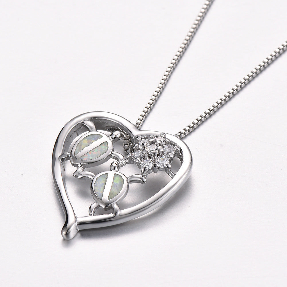 Collier pendentif tortue en or blanc