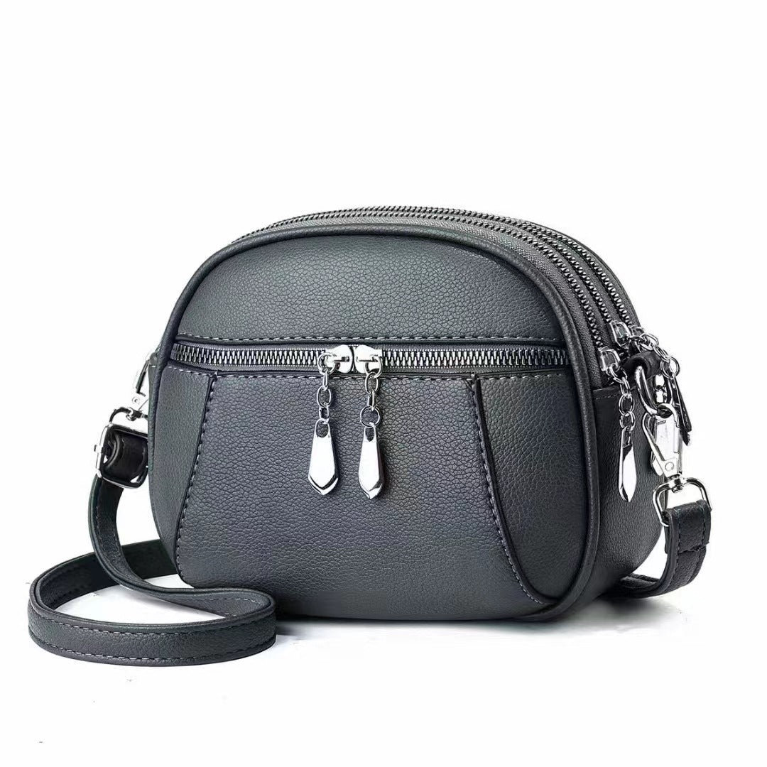 Petit sac à bandoulière rond multi-poches à la mode pour femmes