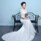 Robe de mariée queue de poisson à la taille