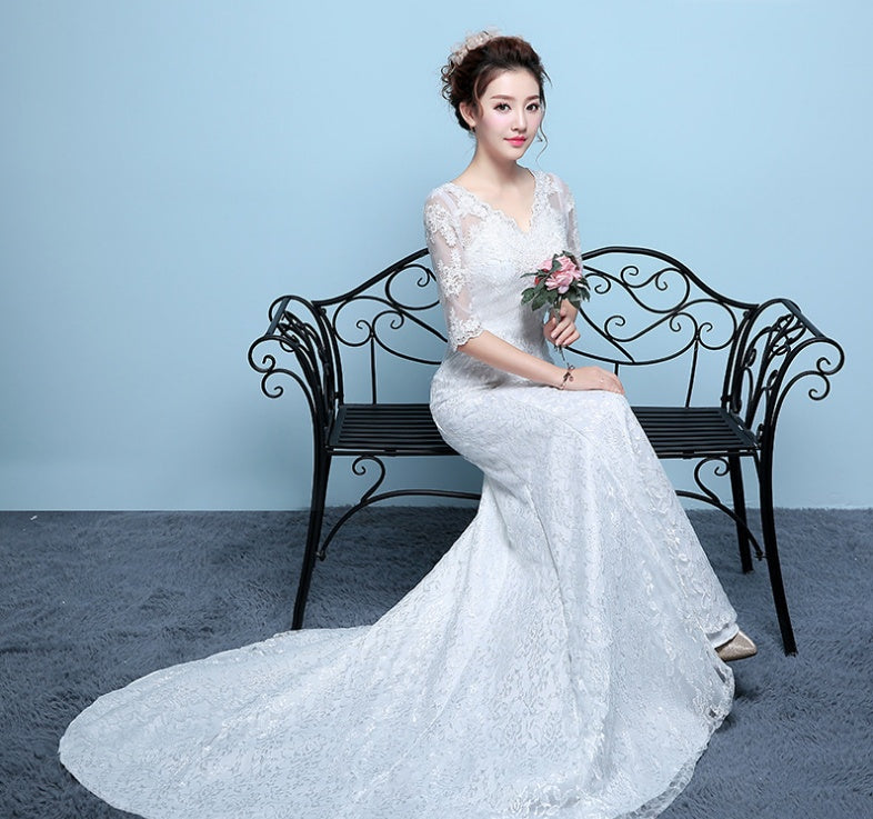Robe de mariée queue de poisson à la taille