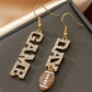 Boucles d'oreilles pendantes or