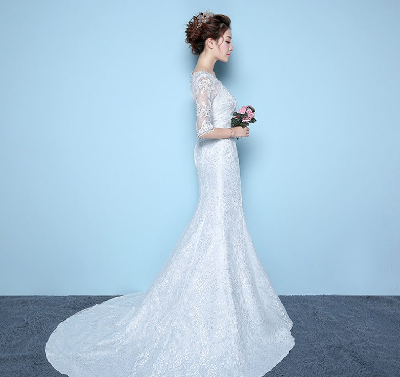 Robe de mariée queue de poisson à la taille