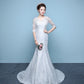 Robe de mariée queue de poisson à la taille