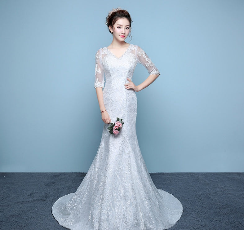 Robe de mariée queue de poisson à la taille