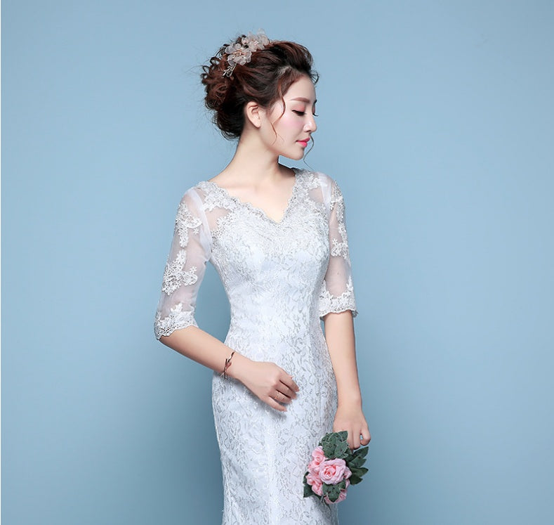 Robe de mariée queue de poisson à la taille