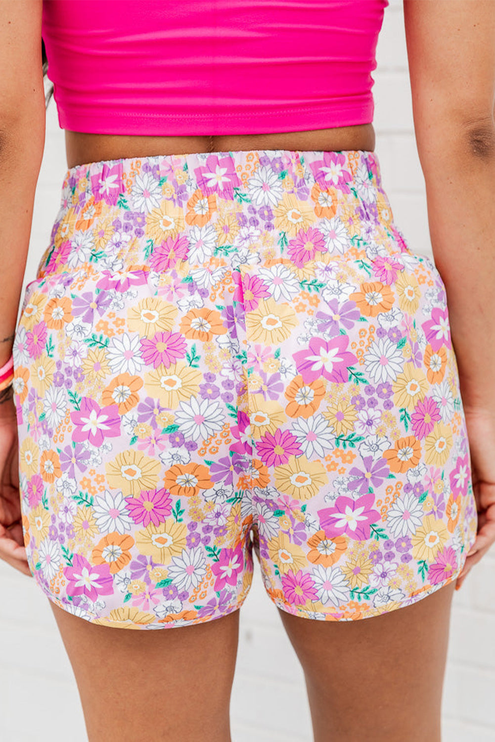 Short d'athlétisme taille haute à motif floral rétro orange