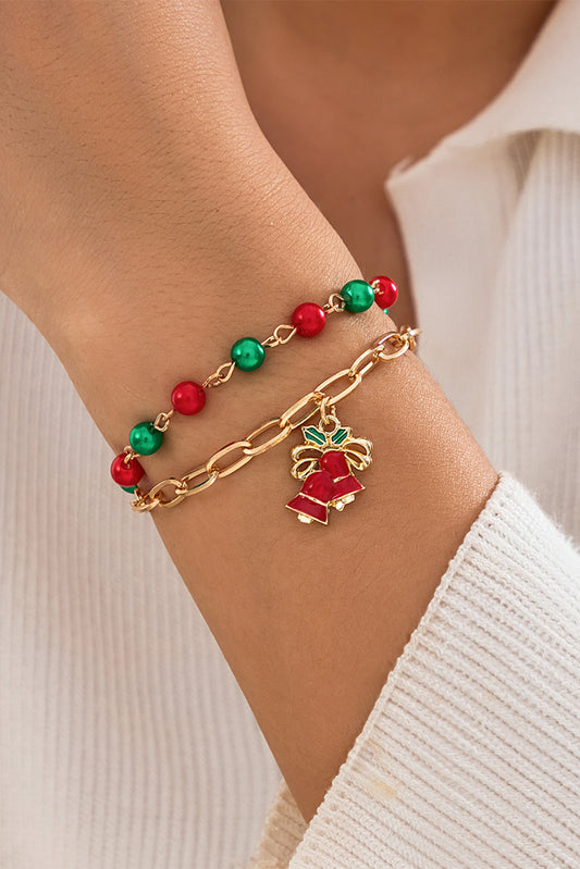 Jeu de bracelets superposés avec pendentifs de Noël en or