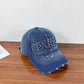 Casquette de baseball en denim délavé avec trou et visière