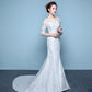 Robe de mariée queue de poisson à la taille