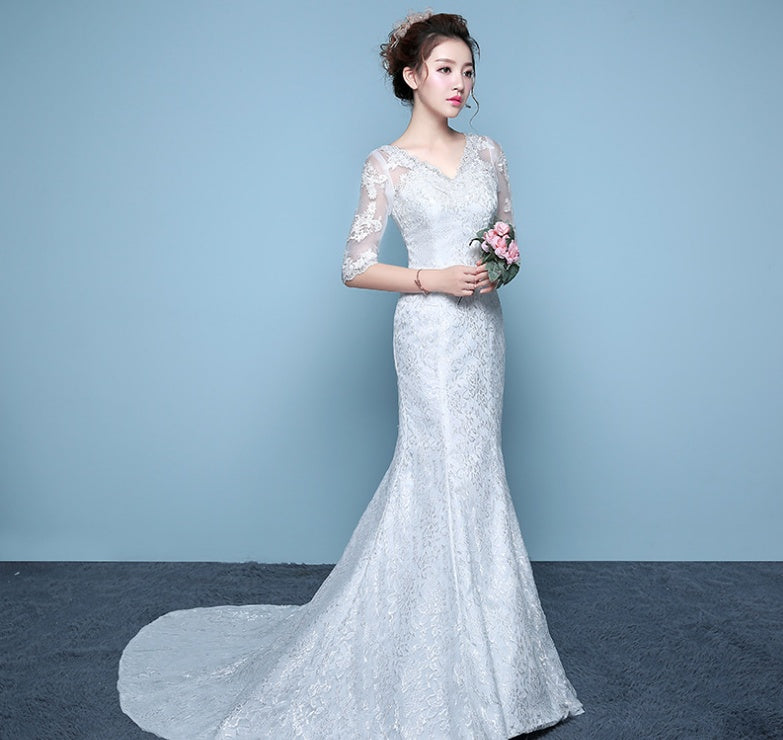 Robe de mariée queue de poisson à la taille