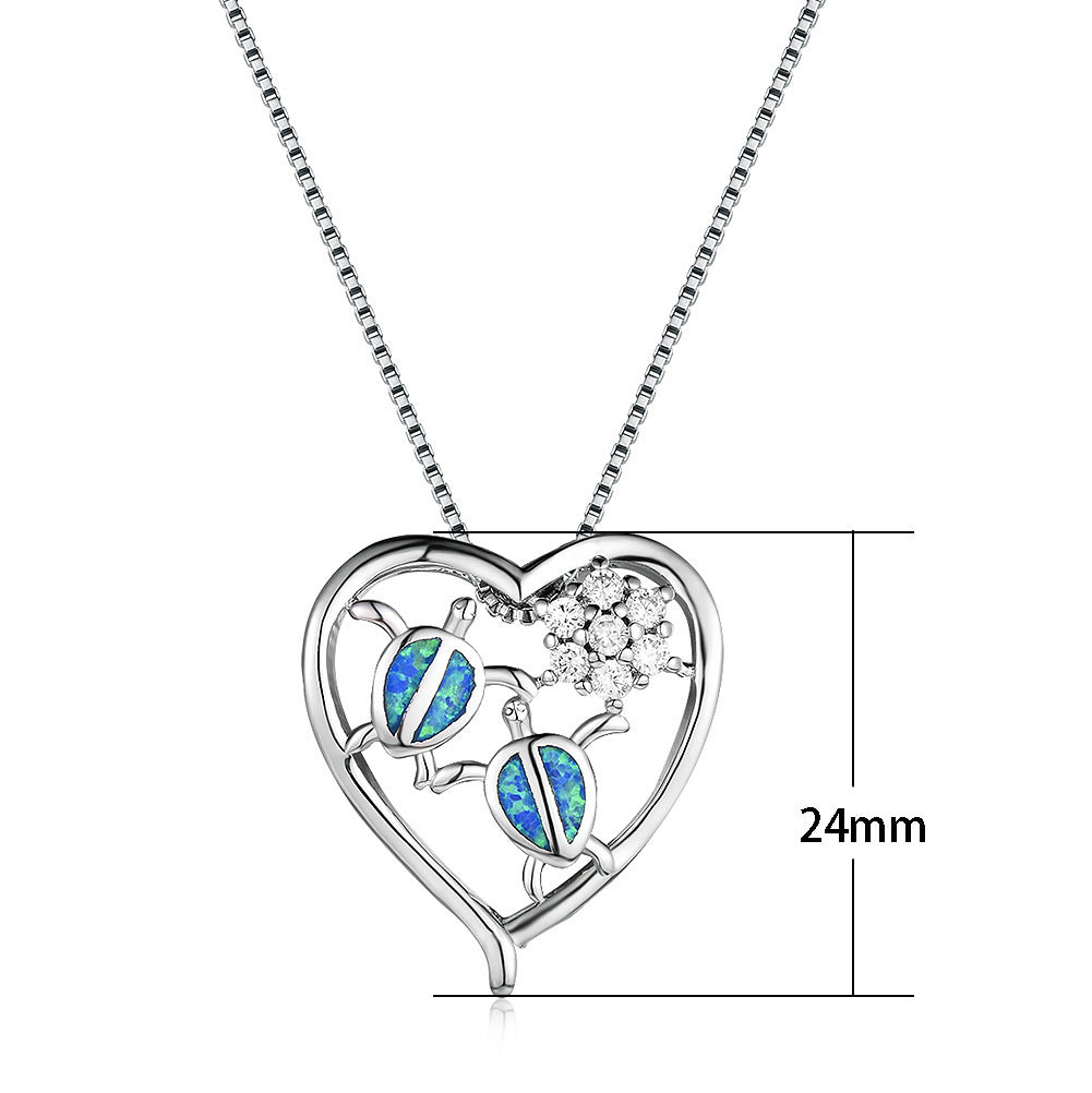 Collier pendentif tortue en or blanc