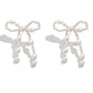 Pendants d'oreilles en forme de nœud papillon avec perles blanches