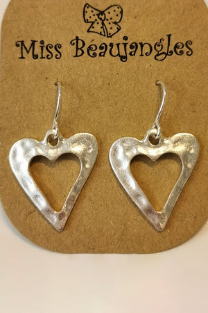 Boucles d'oreilles pendantes en forme de cœur creusé de la Saint-Valentin blanche