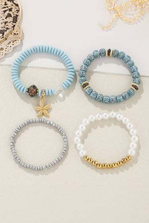 Lot de 4 bracelets perlés avec pendentif étoile de mer bleu clair