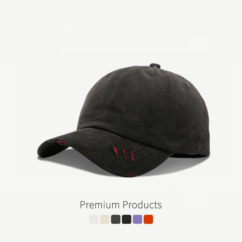 Casquette de baseball à visière incurvée et déchirée
