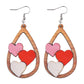 Boucles d'oreilles gouttes d'eau avec insertion de 3 coeurs pour la Saint-Valentin