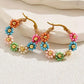 Boucles d'oreilles goutte d'eau en perles de fleurs roses contrastées de forme ronde