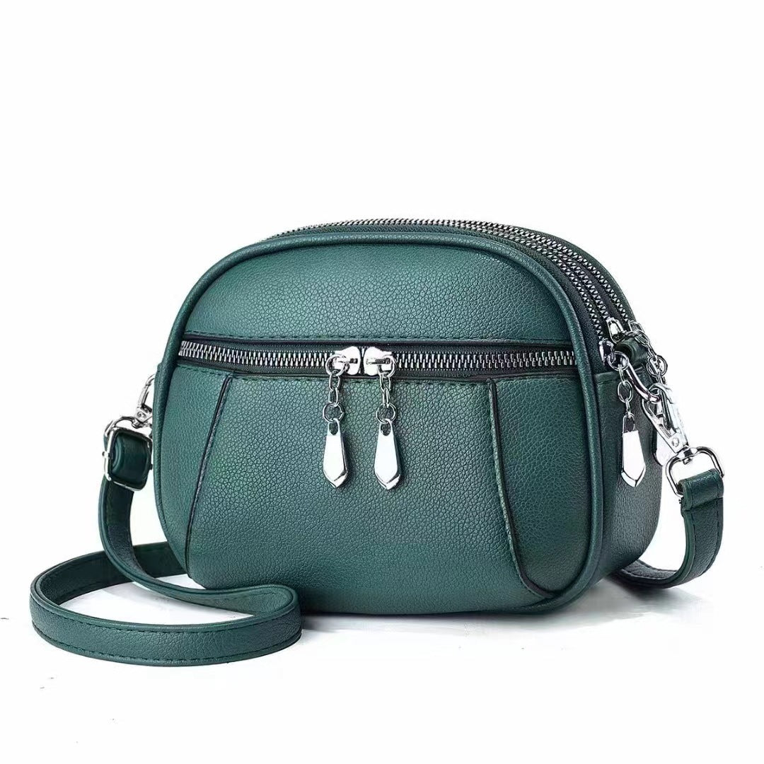 Petit sac à bandoulière rond multi-poches à la mode pour femmes