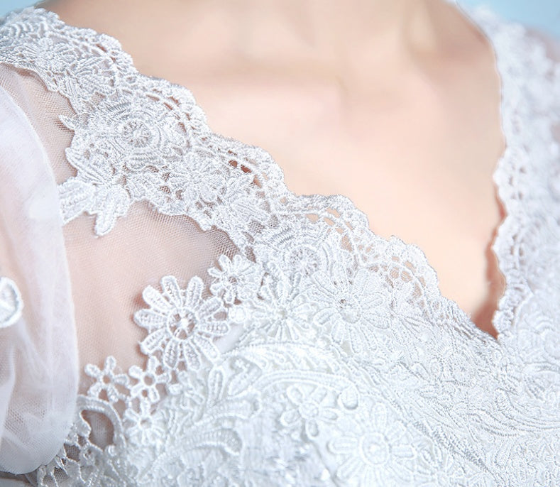 Robe de mariée queue de poisson à la taille