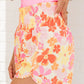 Short d'athlétisme taille haute à motif floral rétro orange