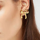 Boucles d'oreilles en forme de noeud avec ruban élégant en or