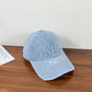 Casquette de baseball en denim délavé avec trou et visière