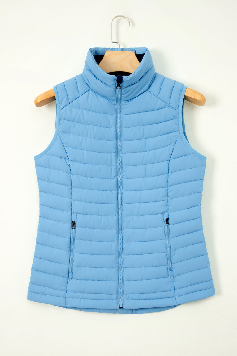 Gilet polaire bleu ciel à col en peluche matelassé et zippé