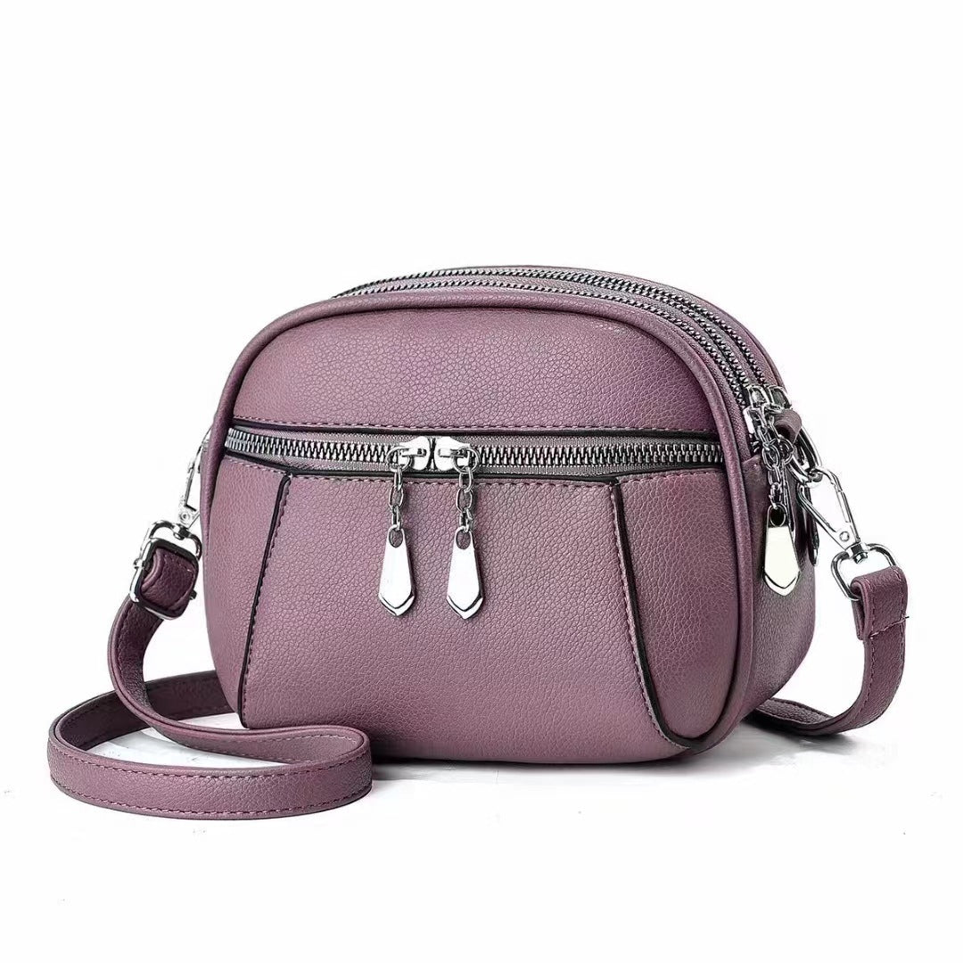 Petit sac à bandoulière rond multi-poches à la mode pour femmes