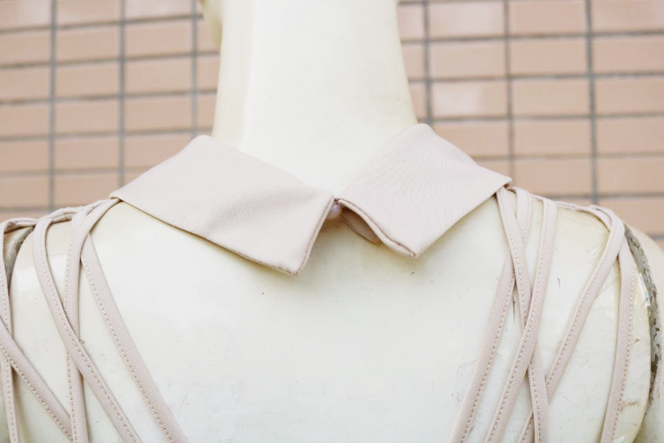 Combinaison d'été pour femmes de couleur unie ajustée et sans dos à la mode