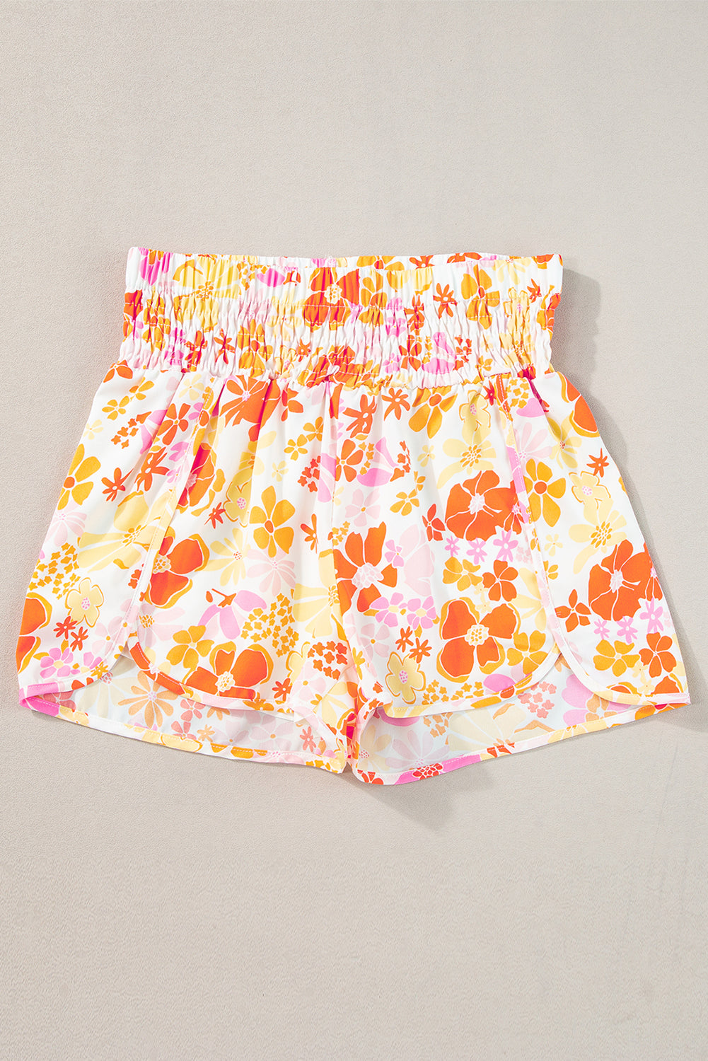 Short d'athlétisme taille haute à motif floral rétro orange