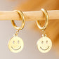 Boucles d'oreilles pendantes en alliage d'or avec visage souriant