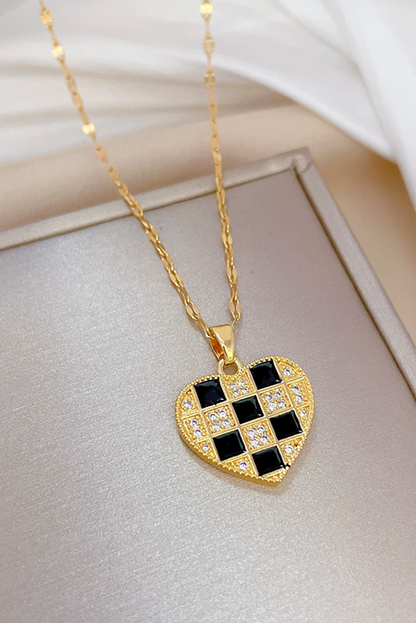 Collier avec pendentif en forme de coeur à damier en or