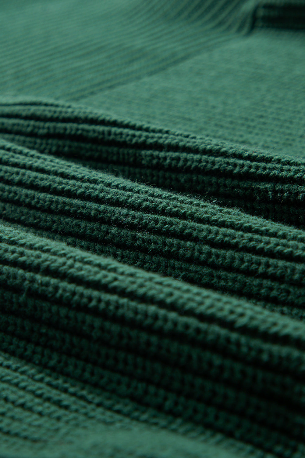 Pull à col ras du cou en tricot texturé vert noir avec manches lanternes