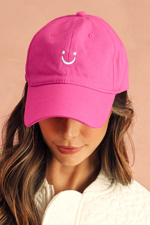 Casquette de baseball à bords arrondis, brodée d'un visage souriant, rouge rosé