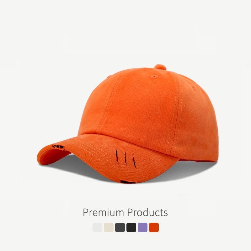 Casquette de baseball à visière incurvée et déchirée