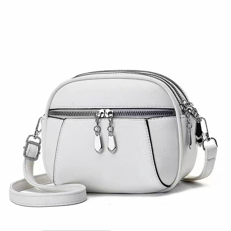 Petit sac à bandoulière rond multi-poches à la mode pour femmes