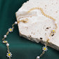 Bracelet de cheville en or avec marguerite et perles