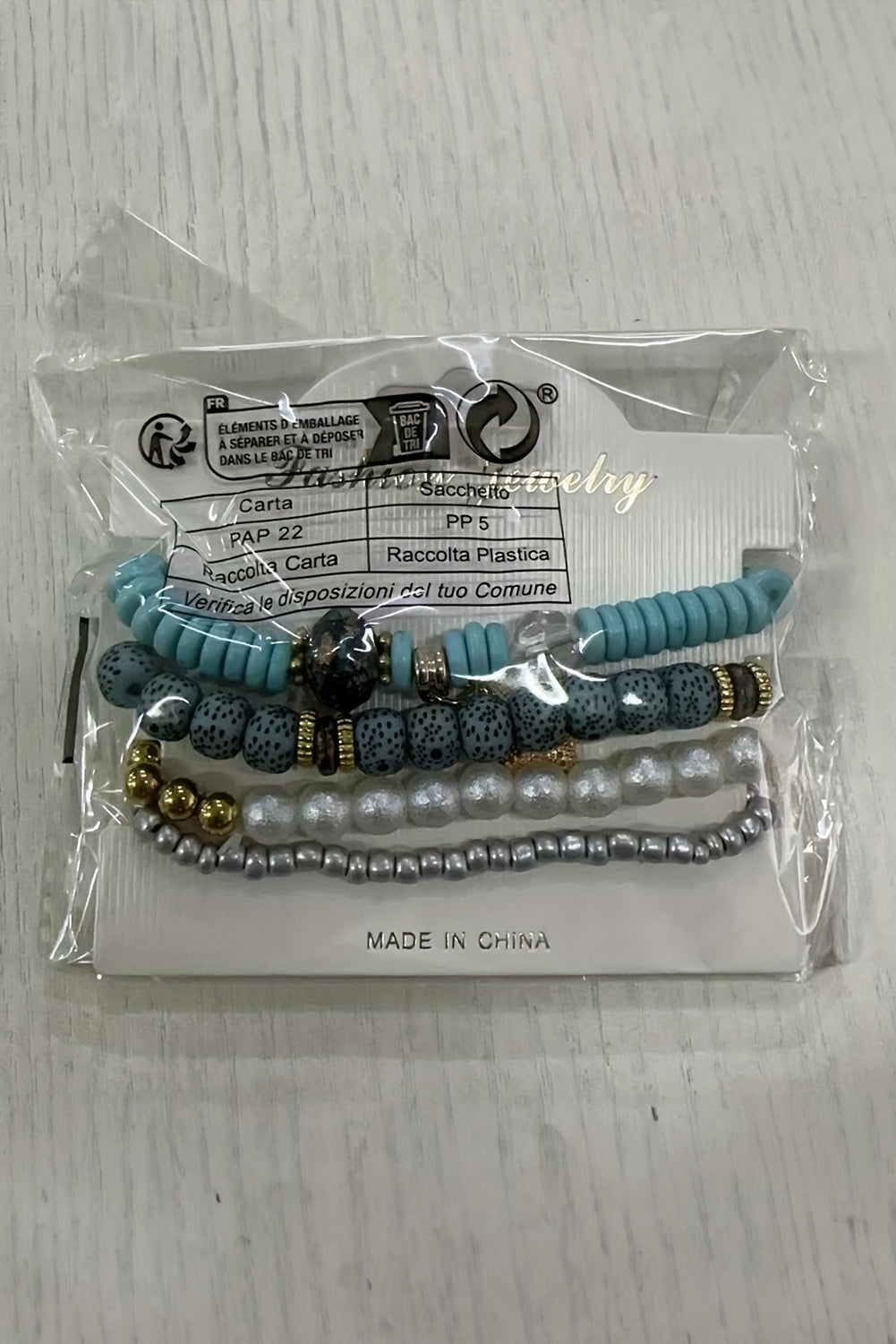 Lot de 4 bracelets perlés avec pendentif étoile de mer bleu clair