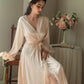 Robe de soirée longue en satin à plumes pour femme