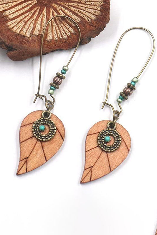 Boucles d'oreilles pendantes en forme de feuille avec décor en or et turquoise du désert