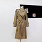 Manteau mi-long à double boutonnage à grand revers