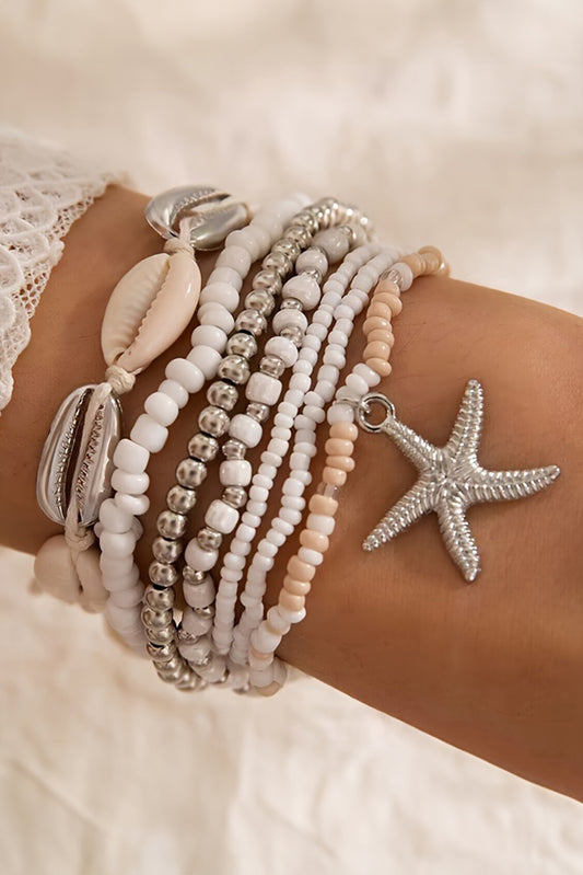 Lot de 7 bracelets en perles avec étoile de mer et coquillage, de couleur blanche