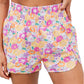 Short d'athlétisme taille haute à motif floral rétro orange