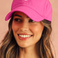 Casquette de baseball à bords arrondis, brodée d'un visage souriant, rouge rosé