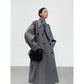 Manteau mi-long à double boutonnage à grand revers